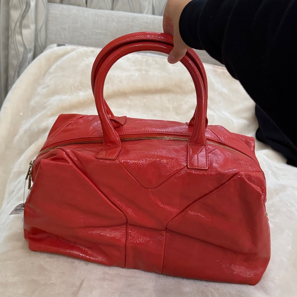 Yves Saint Laurent Red / salmon colored Leather Tote Bag
